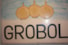 Oud reclamebord voor het uienras Grobol