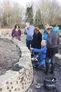 Uitleg over het voegen van de rotstuin aan de wethouders