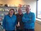 Marieke, Jan Kramer en Martin met de eerste gevulde fles showergel voor de oranjeverenigingen