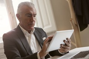 man met iPad