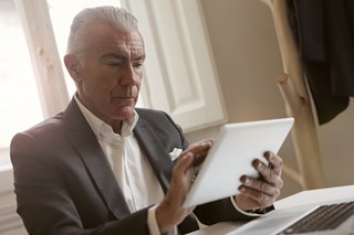 man met iPad